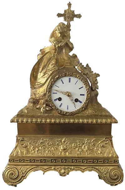 Pendule dorée religieuse
